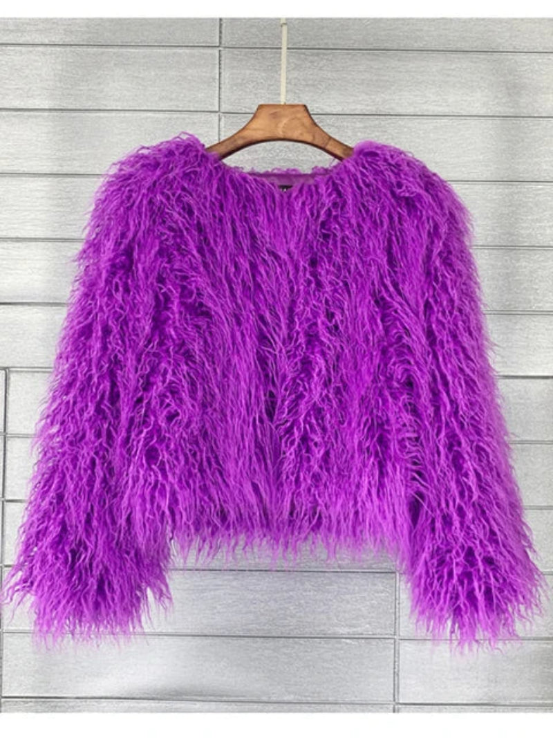 Purple fluffy sweater on a wooden